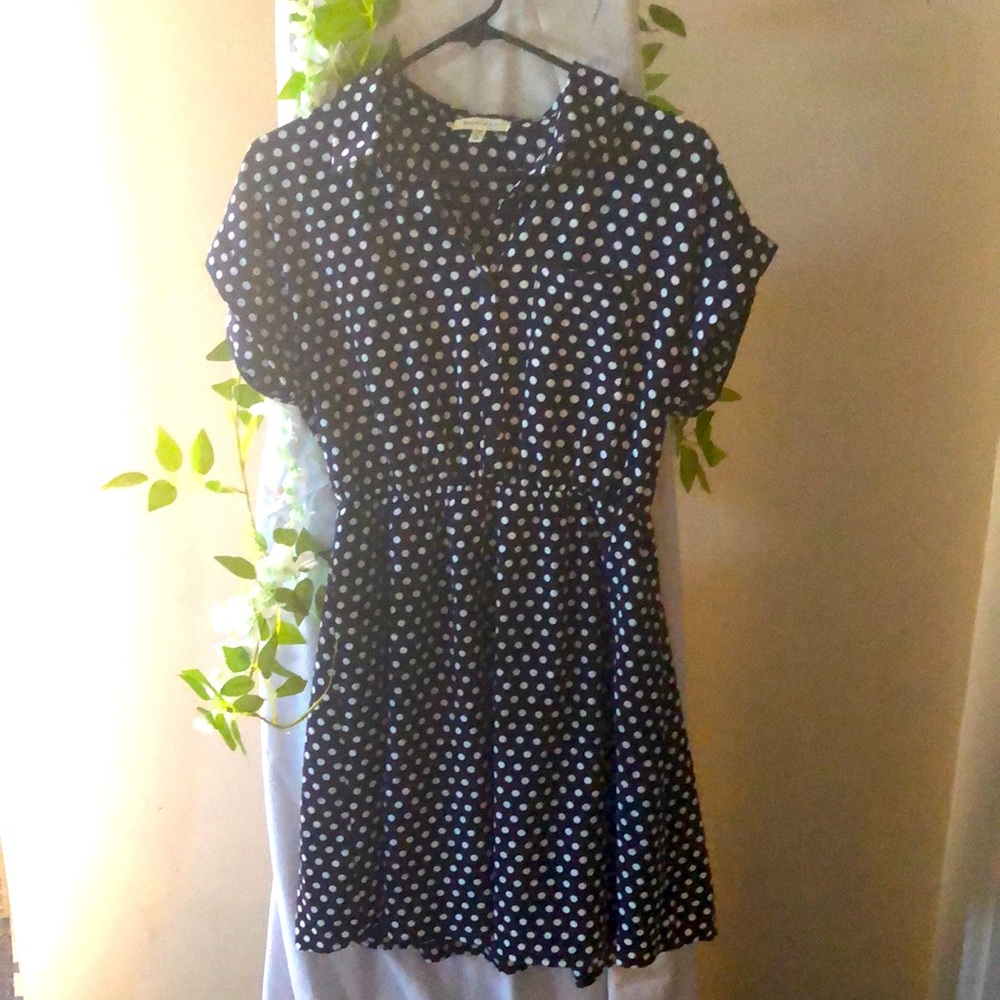 Navy blue dress with polka dots. Kids